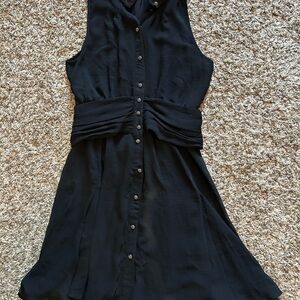 Karl Lagerfeld for Macy’s elegant black dress.